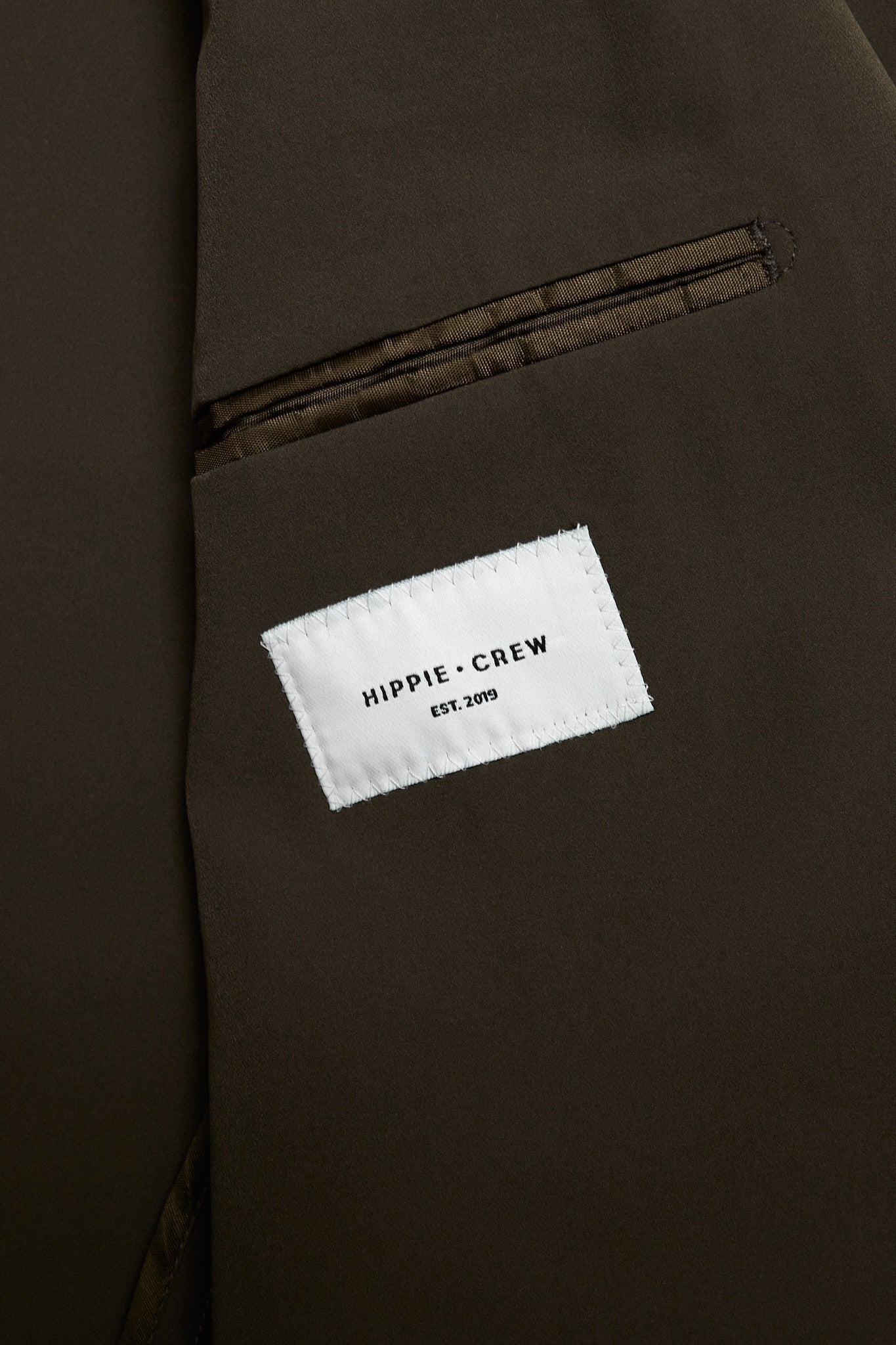 Americana técnica elástica verde