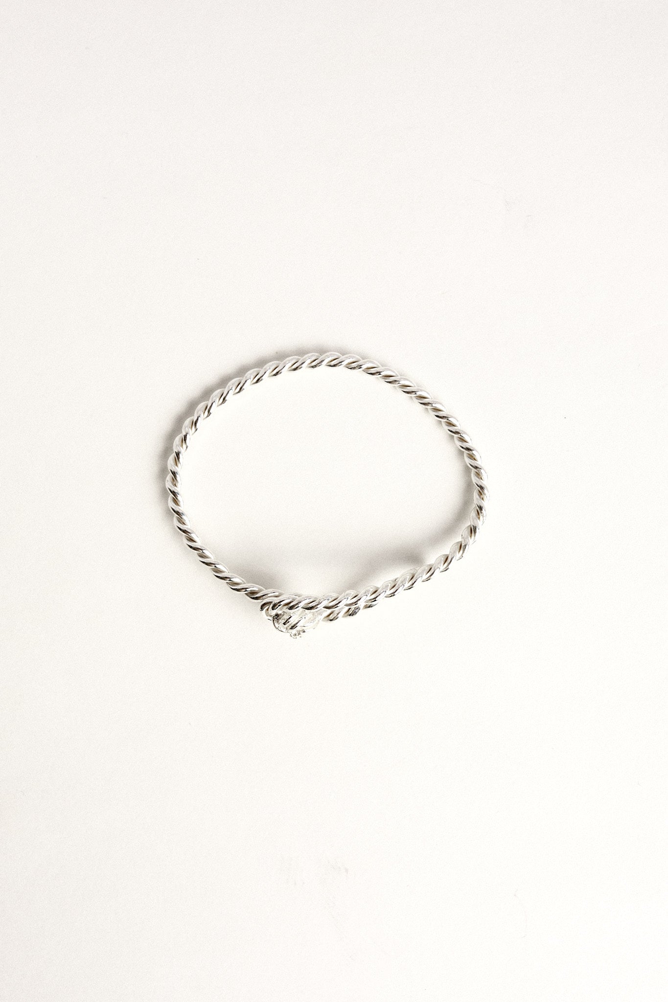 Pulsera plata espiral nudo